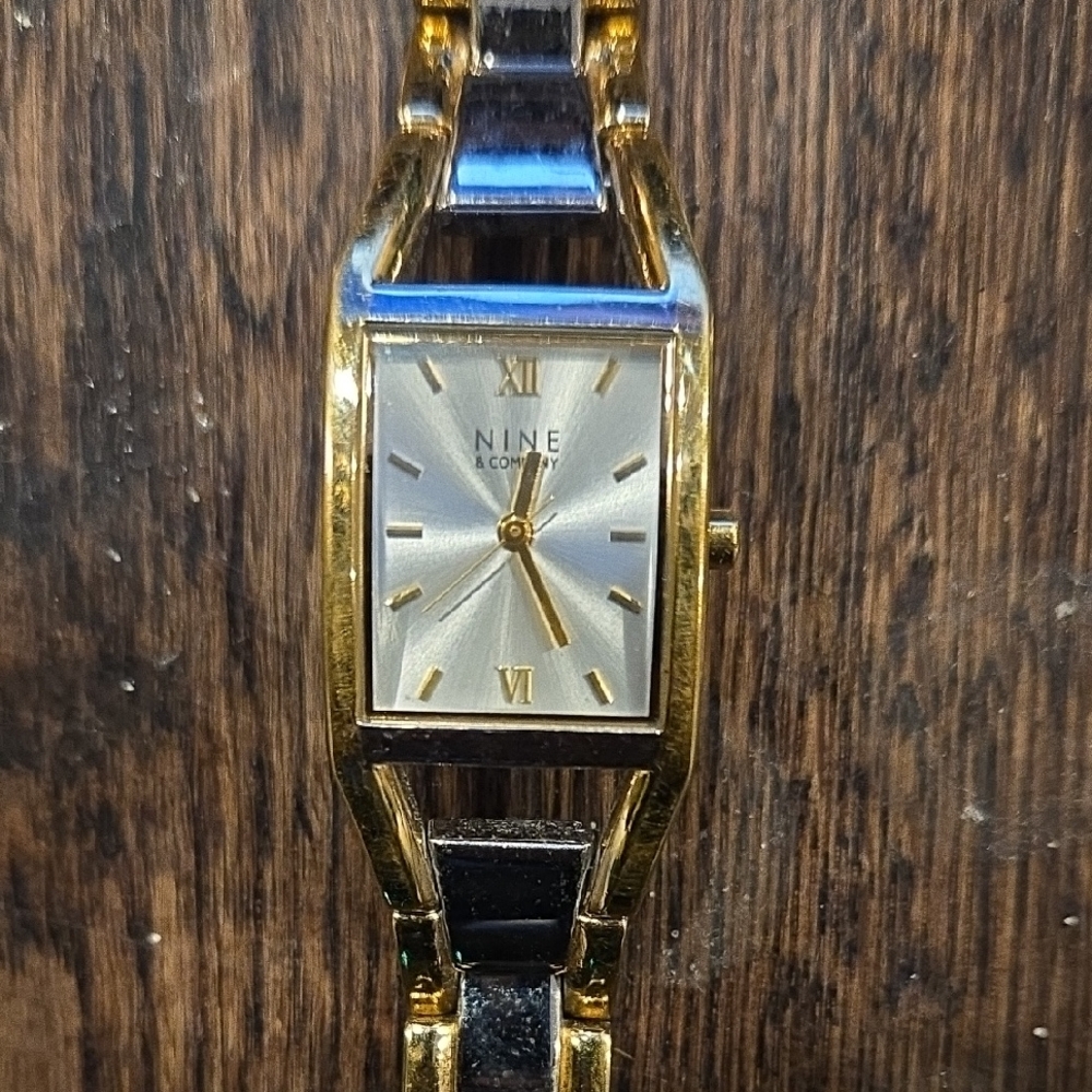 Gold and Black Nine & Co. Watch